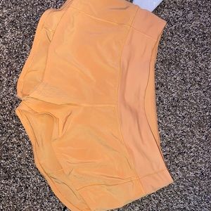 orange lululemon shorts
